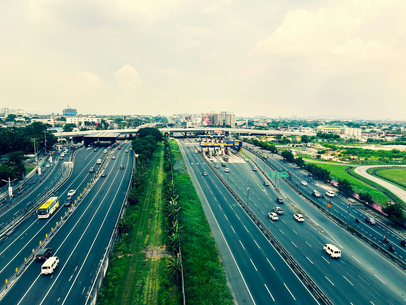 Aerial view of a multi-lane highway with vehicles travelling in both directions